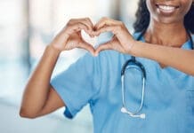 Nurse making heart