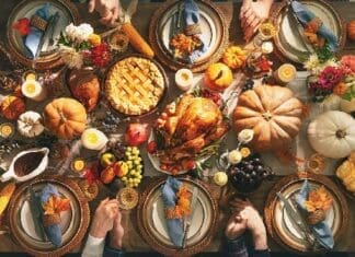 The Forgotten Medicine of Thanksgiving thanksgiving table gettyimages 1276401241