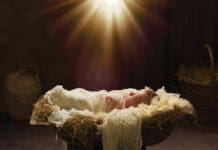 Jesus Baby in Manger iStock 1759710489