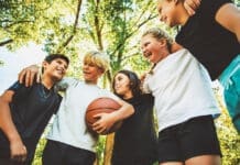 Kids playing basketball iStock 2243962299
