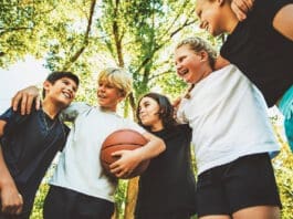 Kids playing basketball iStock 2243962299