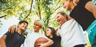 Kids playing basketball iStock 2243962299