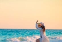Happy Woman on Beach iStock 816521498